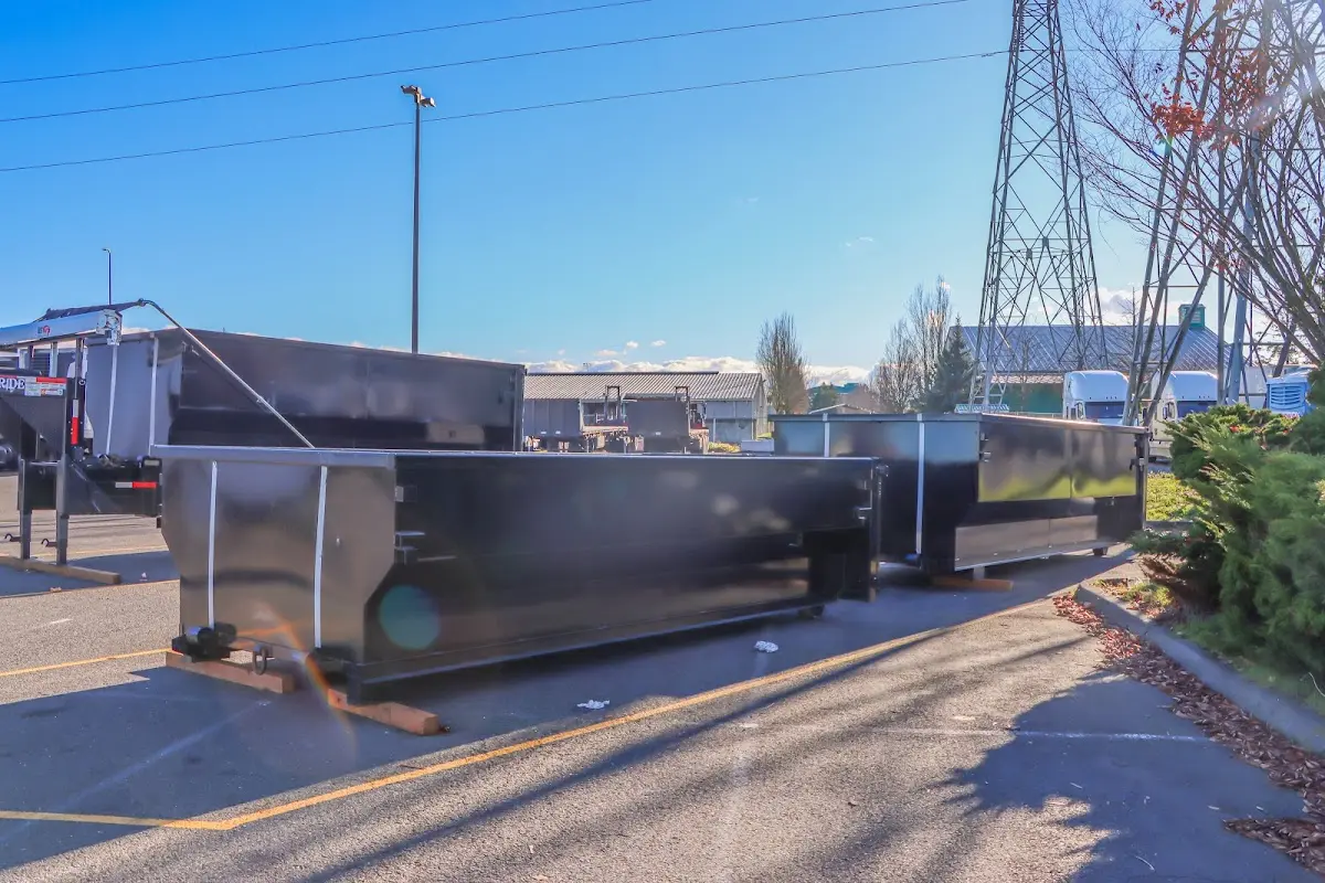 Roll-off dumpster ready for waste disposal at job site for Commercial Dumpster Rental in Long Branch